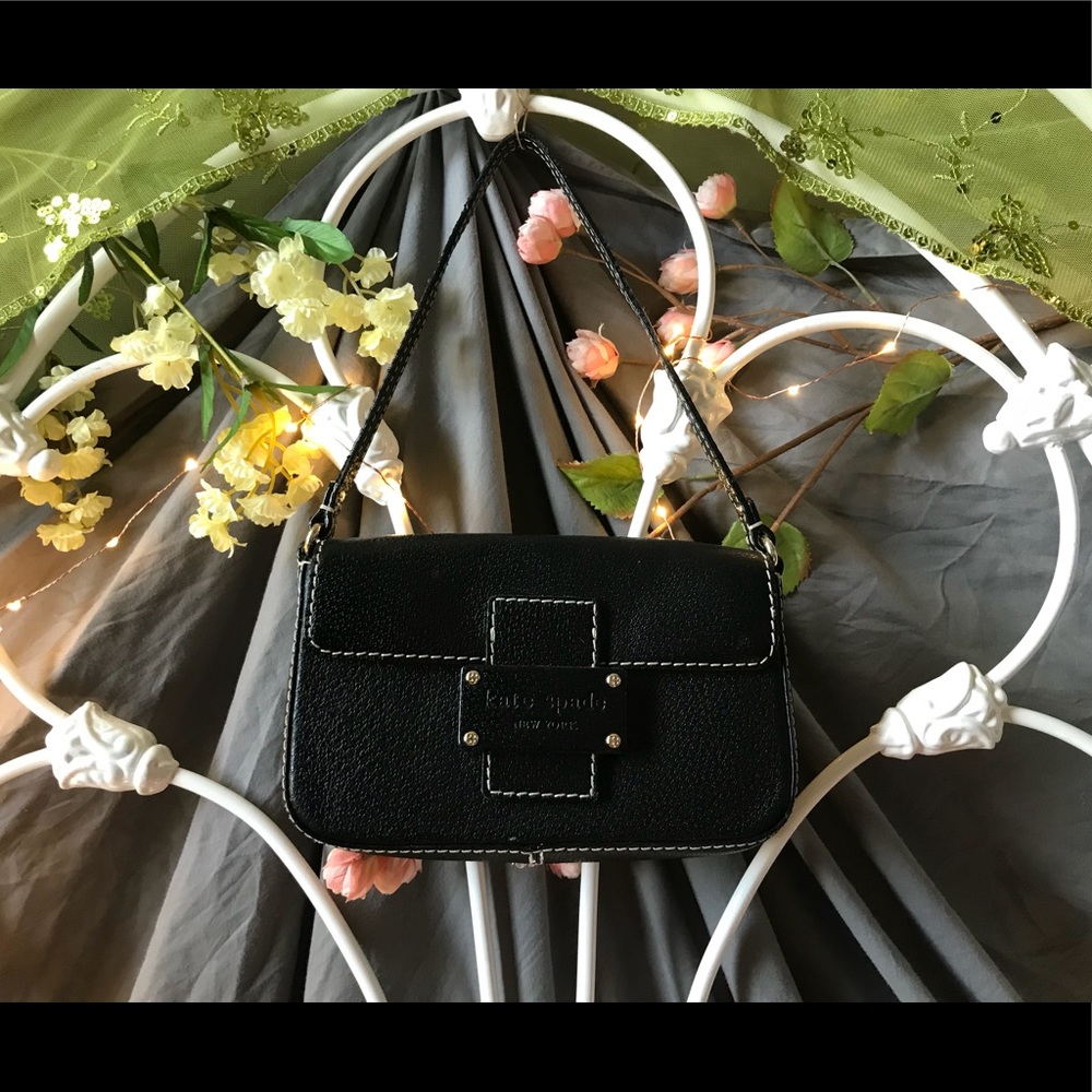 Black Kate Spade bag with white contrast stitching